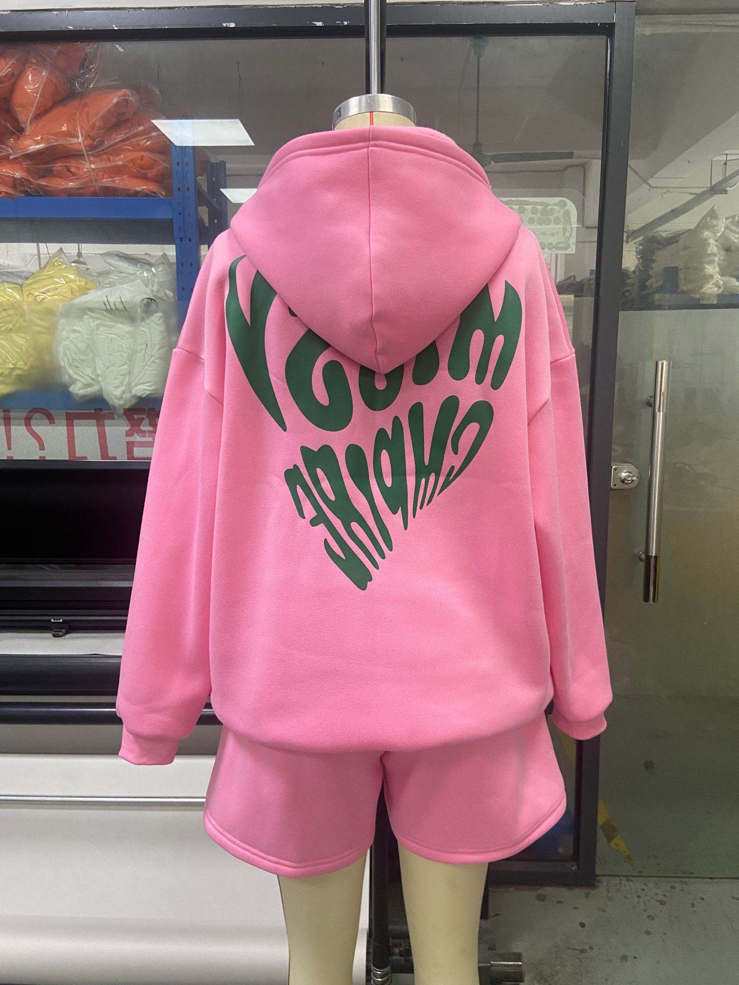 Conjunto de dos piezas de sudaderas con capucha y pantalones cortos de manga larga